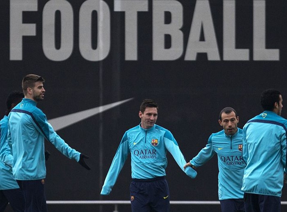 Messi com o compatriota Mascherano no treino do Barcelona: argentino está confiante para a Copa | Gustau Nacarino / Reuters