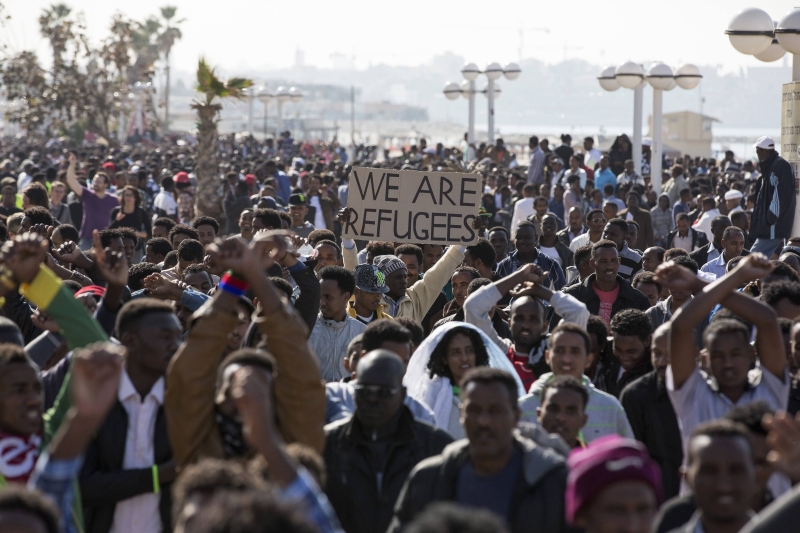 Imigrantes africanos se reuniram em frente à embaixada dos EUA para cobrar providências sobre a prisão de compatriotas | Baz Ratner/Reuters