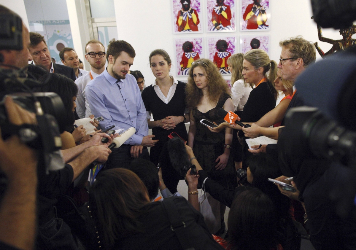 Integrantes da banda punk russa Pussy Riot dão entrevista coletiva em Cingapura | Reuters/Edgar Su