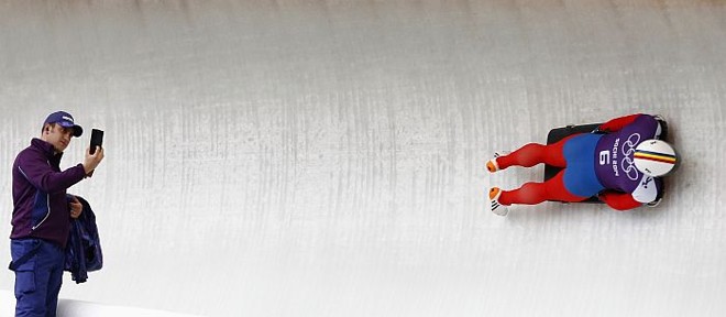 Romeno Dorin Velicu na descida da prova de skeleton |