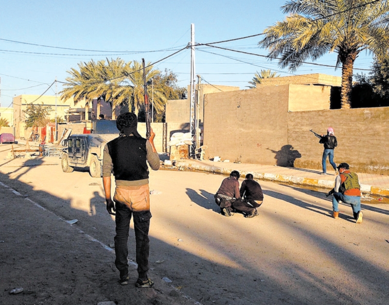 Forças de segurança no Iraque vêm combatendo o Estado Islâmico do Iraque e do Levante, grupo militante que resgatou sunitas da prisão para reforçar suas fileiras | Reuters