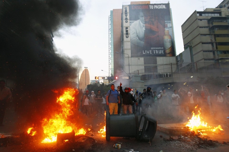 Protestos no país sul-americano ficaram violentos | Reuters/Carlos Garcia Rawlins