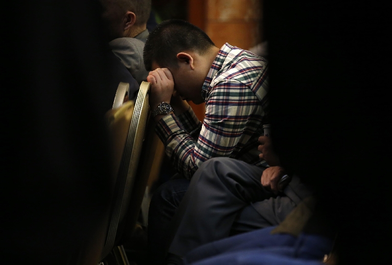 Parente de passageiro do voo MH370 aguarda notícias | Kim Kyung-Hoon/Reuters