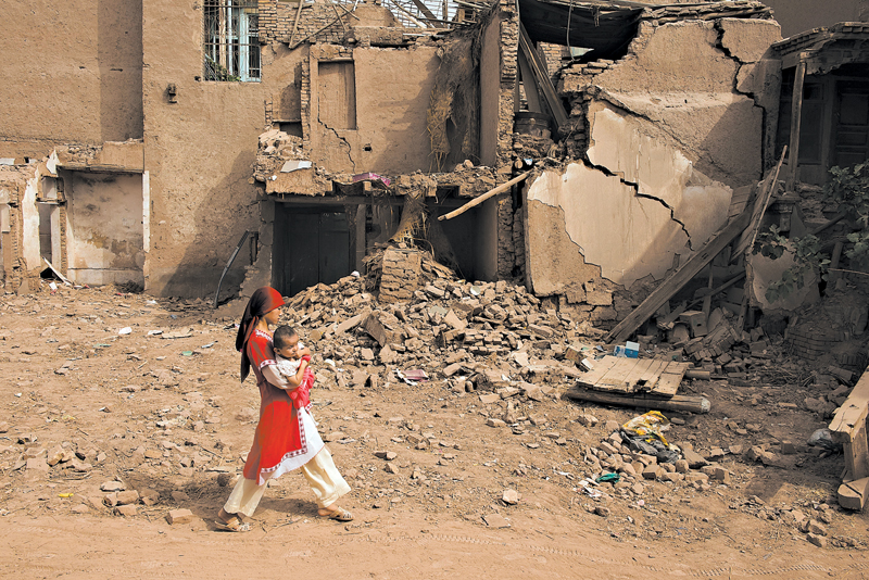 O governo da China demoliu milhares de casas centenárias em Kashgar, irritando os uigures, grupo étnico muçulmano | Gilles Sabrie para The New York Times