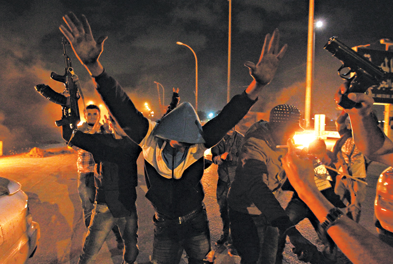 Mais de cem figuras de destaque foram mortas em Benghazi nos últimos dois anos; acima, adversários do governo protestam | Abdullah Doma/Agence France-Presse Getty Images