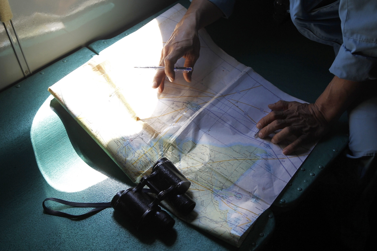 Busca feita pelas equipes de resgate da Malásia não localizaram destroços na área apontada pelas imagens de satélite | EFE/Luong Thai Linh