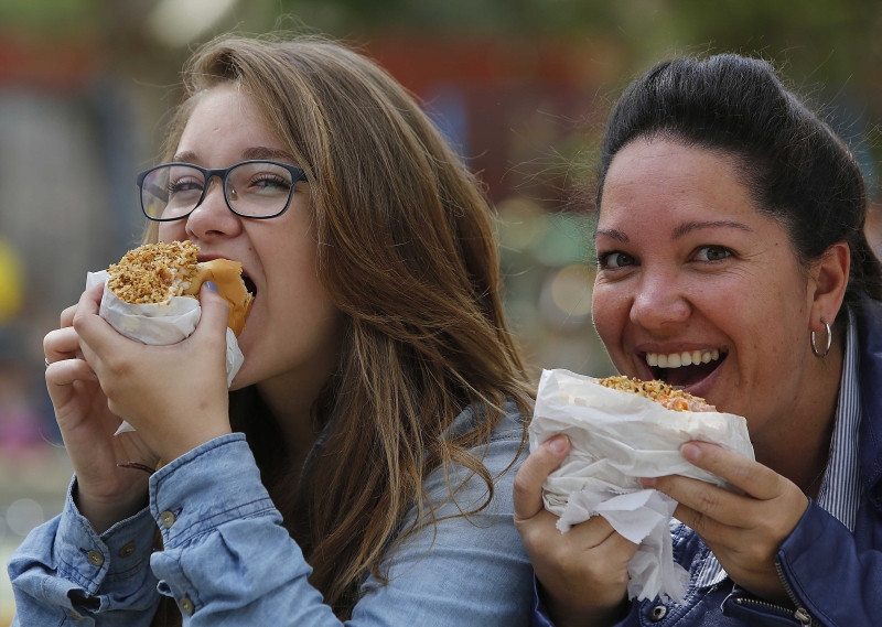 Ao todo, 18 mil cachorros-quentes foram vendidos durante a 2ª edição da Vinada Cultural | Jonathan Campos / Gazeta do Povo
