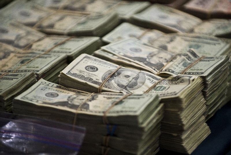 O dólar à vista caiu 1,02%, para R$ 2,224 | Ronaldo Schemidt/AFP PHOTO