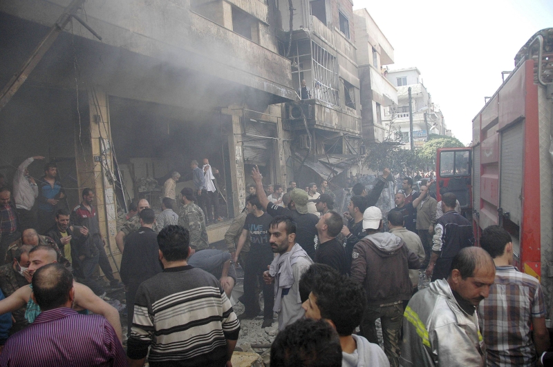 Dois carros-bombas explodiram em Homs, numa região alauita, ramificação do islamismo de que faz parte Bashar al-Assad | Sana/Reuters