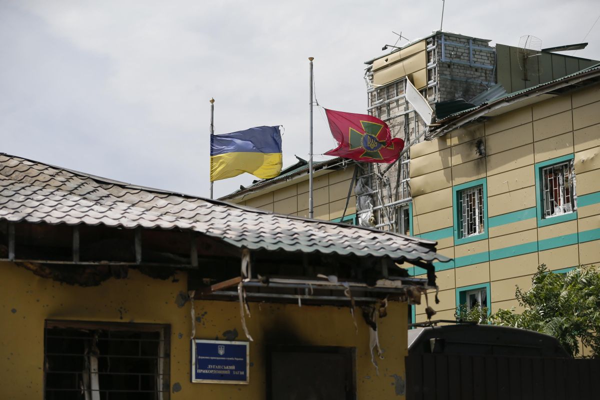 Edifícios destruídos durante os últimos conflitos no leste da Ucrânia | REUTERS/Gleb Garanich