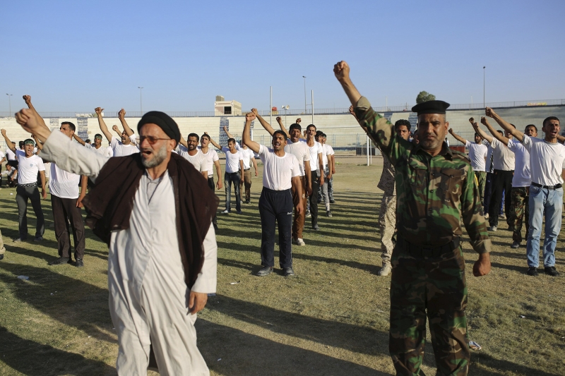 Apesar das derrotas do governo, voluntários xiitas se apresentam para ingressar nas Forças Armadas iraquianas | Ahmad Mousa/Reuters