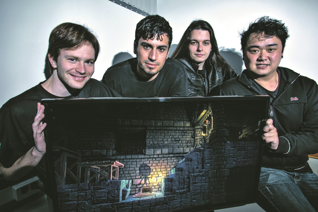 Luiz Monclar, Eduardo Schildt, Rhandros Dembicki e Robson Sewo trabalham desde dezembro no desenvolvimento do jogoLiaison. | Marcelo Andrade / Gazeta do Povo