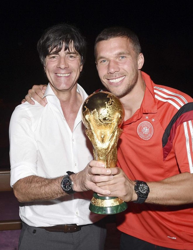 O técnico Joachim Löw e o atacante Podolski na festa da Alemanha no hotel no Rio | 