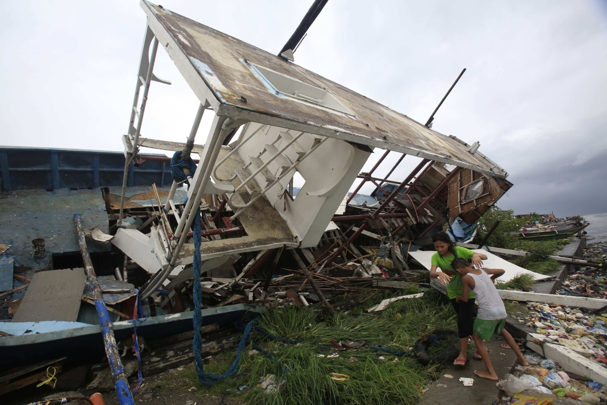 Tufão destruiu casas em Baseco, na área metropolitana de Manila | Reuters/Romeo Ranoco