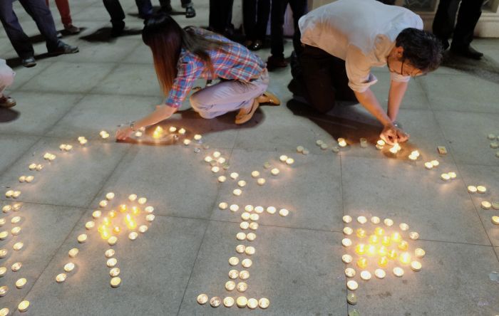 Malásia faz vigília pelas 298 vítimas do voo MH17, da Malaysia Airlines | EFE/Shamshahrin Shamsudin