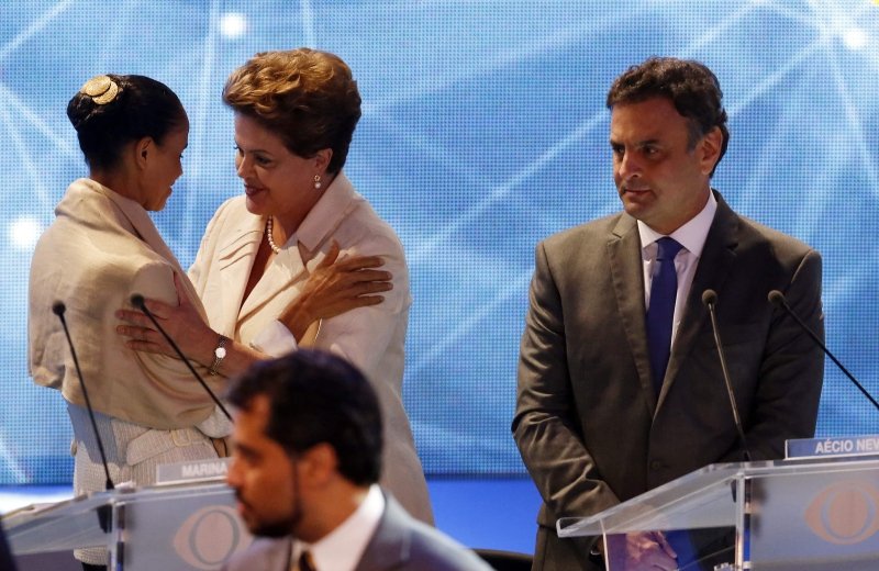 Marina cumprimenta Dilma observada por Aécio: gentilezas só antes do debate | Paulo Whitake/Reuters