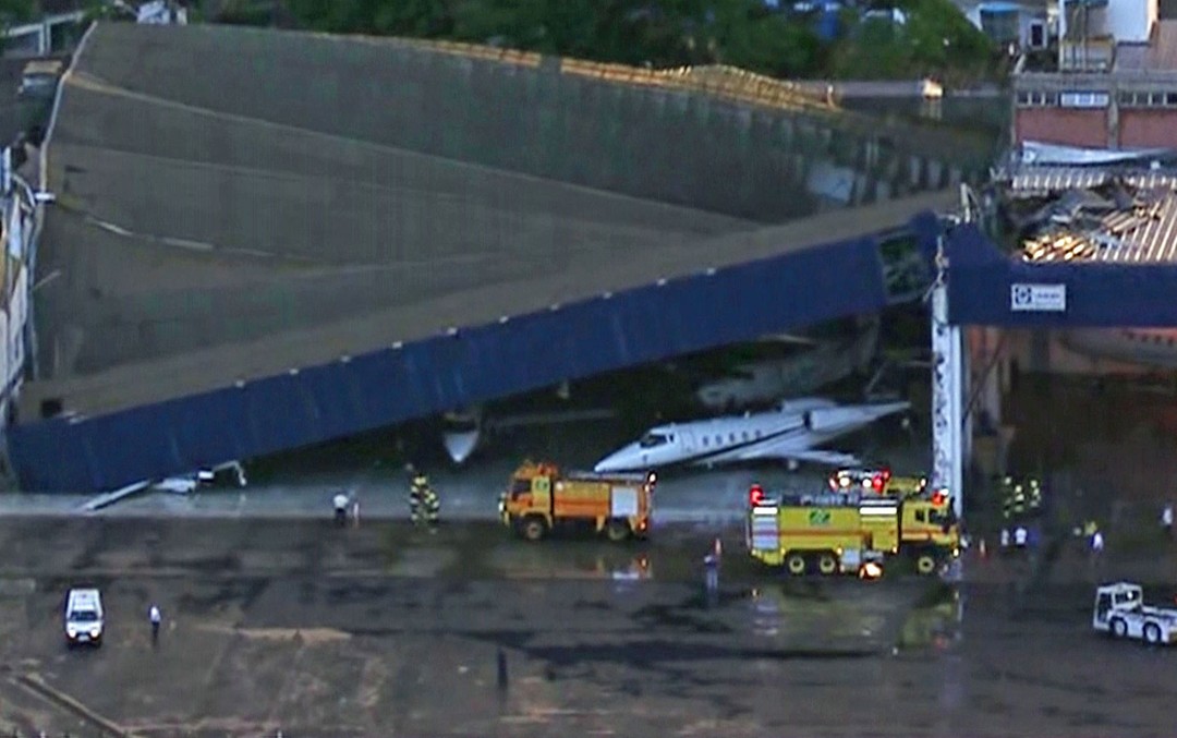 O acidente aconteceu por volta das 19h e atingiu os hangares das empresas TAM e Target | Reprodução / TV Globo