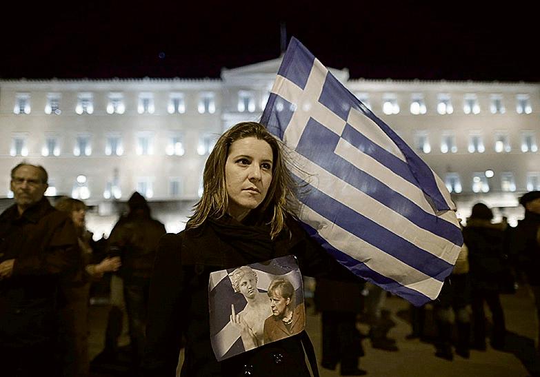 Governo grego convenceu Eurogrupo a ampliar ajuda financeira. | Yannis Kolesidis/Efe