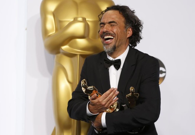 Iñarritu é o sexto diretor a ganhar também como roteirista e filme em um único Oscar | LUCY NICHOLSON/REUTERS