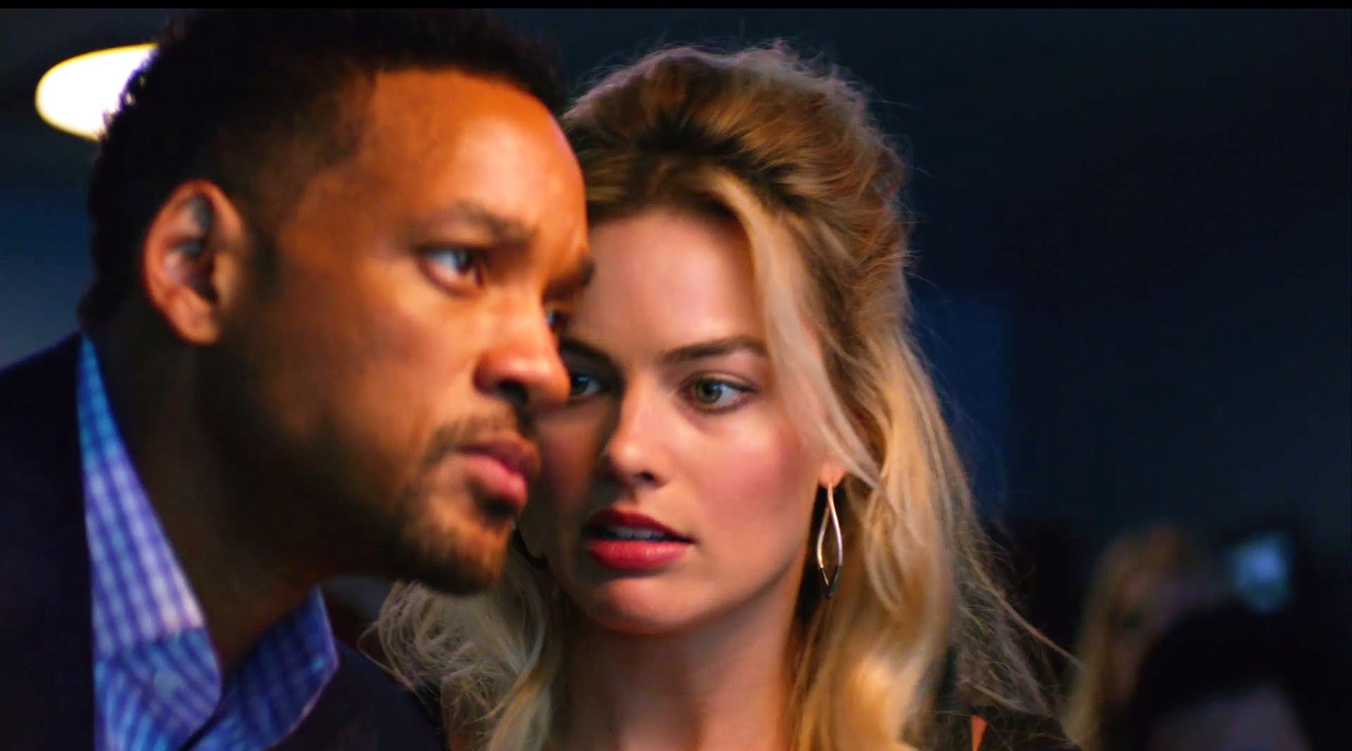 Smith tem ótima química com a atriz australiana Margot Robbie. | Divulgação