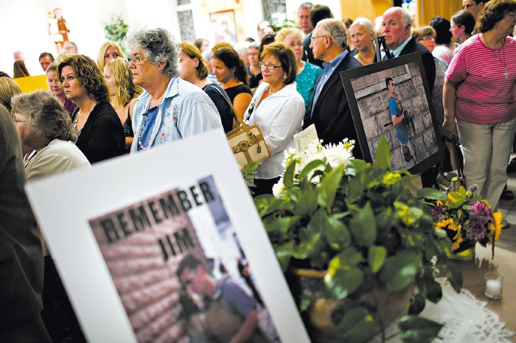 O funeral de James Foley, que teria se convertido ao islã durante o cativeiro na Síria | Dominick Reuter/Agence France-Presse — Getty IMAGES/