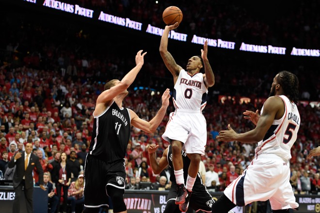 PROTAGONISTA. O aramador Jeff Teague, do Atlanta Hawks, foi decisivo no último quarto e garantiu a vitória do time. | Dale Zanine/USA Today Sports