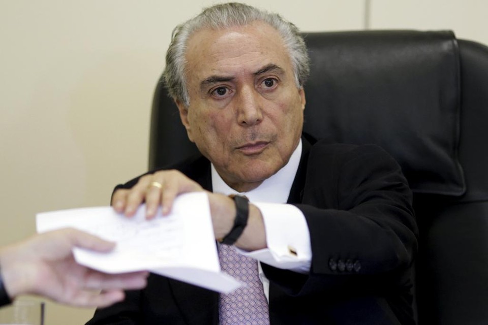 O vice-presidente afirmou que a discussão sobre postos do segundo escalão no Executivo “está sendo organizado”. “Em breve tempo vamos tirar isso da frente.” | UESLEI MARCELINO/REUTERS
