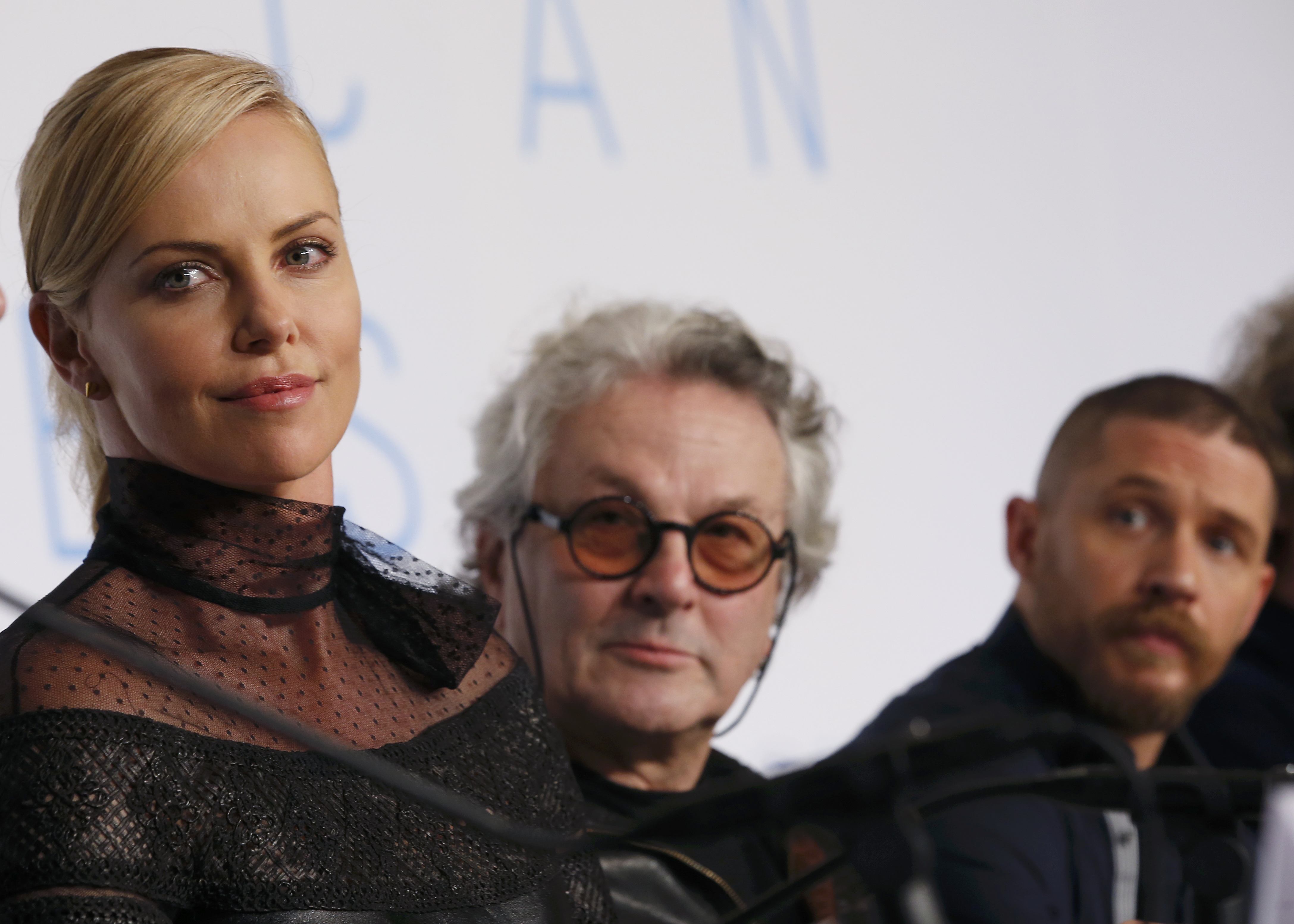 Charlize Theron, George Miller e Tom Hardy em Cannes | Eric Gaillard/Reuters