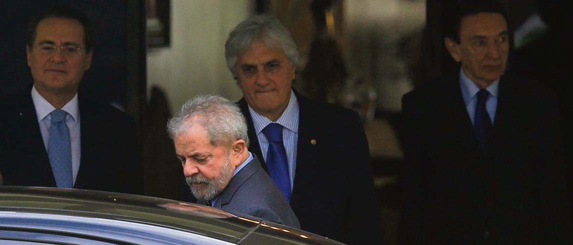 Lula com Renan Calheiros, Delcídio Amaral e Edson Lobão (da esq. para dir.): projeto “esfarelando”. | Ueslei Marcelino/Reuters