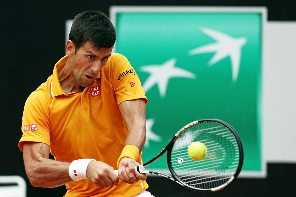 O sérvio Novak Djokovic teve dificuldades para chegar à semifinal em Roma, contra o espanhol David Ferrer. | Alessandro Dimeo/EFE