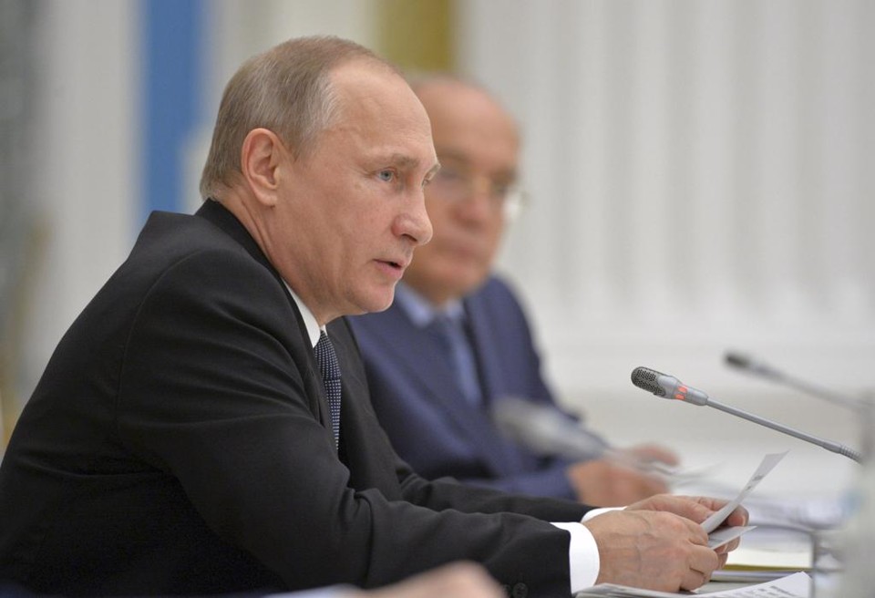 Vladimir Putin durante encontro em Moscou nesta quinta-feira. Político vê ação orquestrada para tirar Mundial de 2018 do seu país. | RIA NOVOSTI/REUTERS