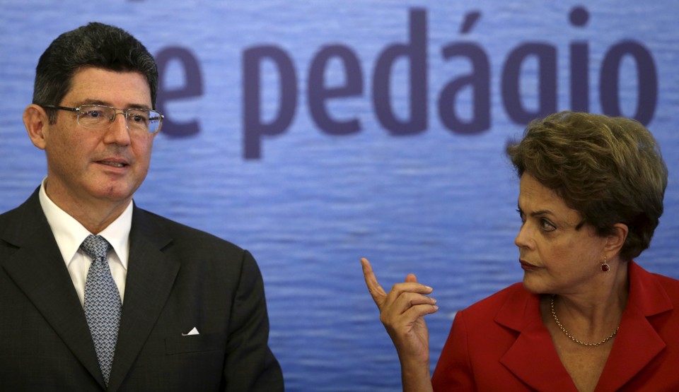 Levy com a presidente Dilma: sintonia para abafar as críticas do próprio PT. | Ueslei Marcelino/Reuters