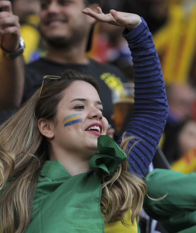 Torcedores brasileiros marcam presença no jogo. | JOSE LUIS SAAVEDRA/REUTERS