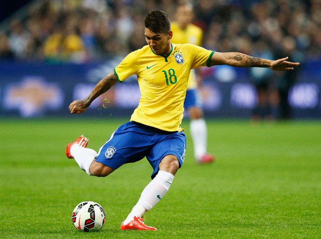 ROBERTO FIRMINO. Destaque da Copa São Paulo de 2009 e alçado ao time principal do Figueirense no mesmo ano, Firmino transferiu-se ao Hoffenheim com 19 anos e tinha tudo para ser mais um brasileiro a sumir no futebol europeu. Entrou no radar da seleção com Dunga e não decepcionou: em seis jogos, marcou três gols. | Dean Mouhtaropoulos/Getty Images
