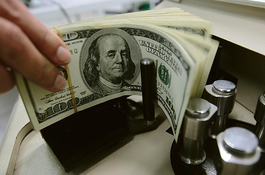 Em seis meses, dólar subiu de R$ 2,57 para R$ 3,10, passando por um pico de R$ 3,26 em março. | Sukree Sukplang/Reuters
