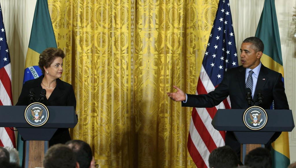 Dilma Rousseff no encontro com o presidente dos EUA Barack Obama em Washington. | KEVIN LAMARQUE/REUTERS