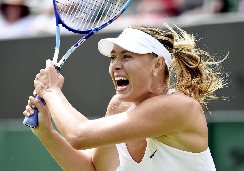 Maria Sharapova passou fácil pela holandesa Richel Hogenkamp pela segunda rodada de Wimbledon. | Facundo Arrizabalaga/EFE