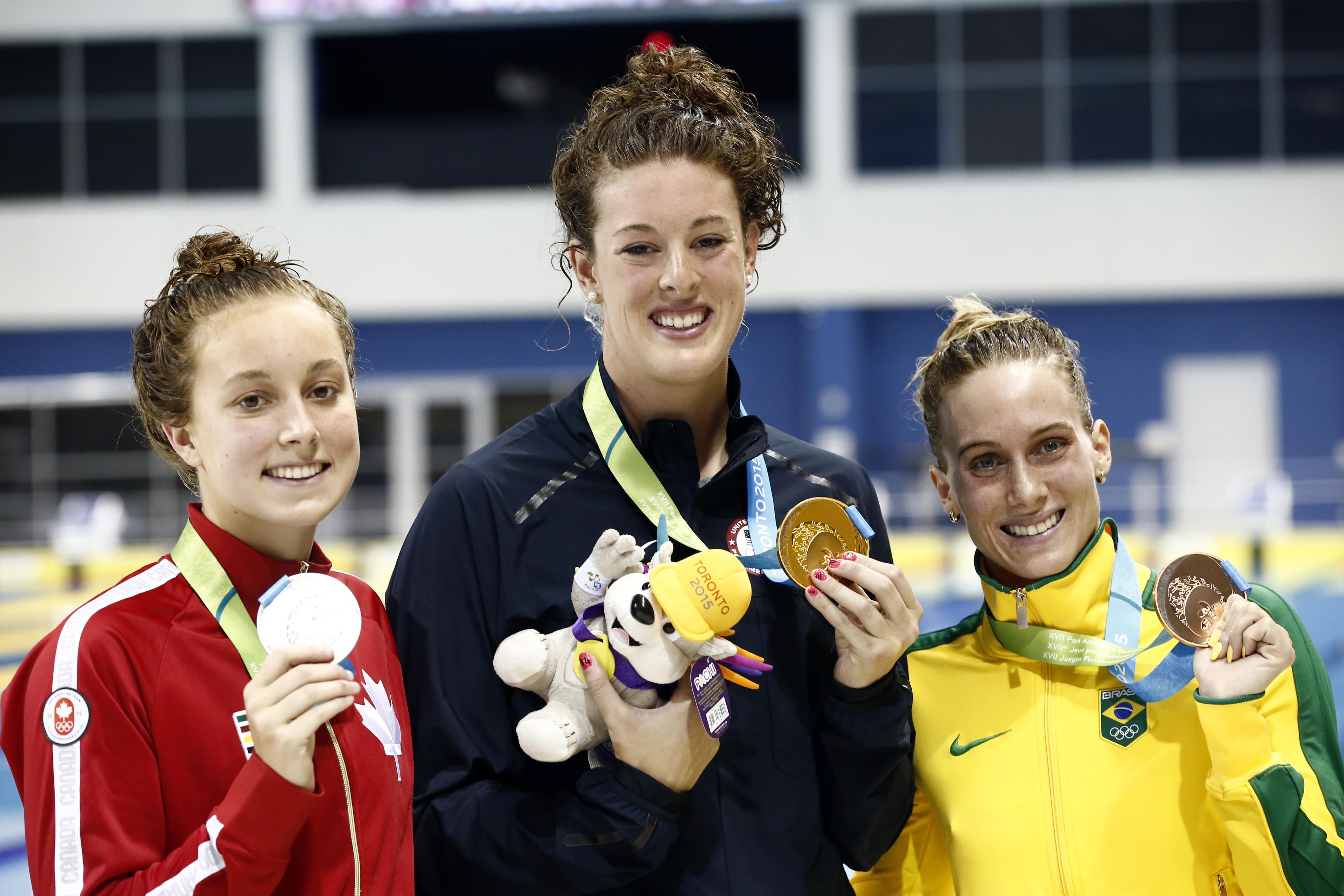 A canadense Emily Overholt, a americana Allison Schmitt, vencedora da prova, e a brasileira Manuella Lyrio | Rob Schumacher/USA Today Sports