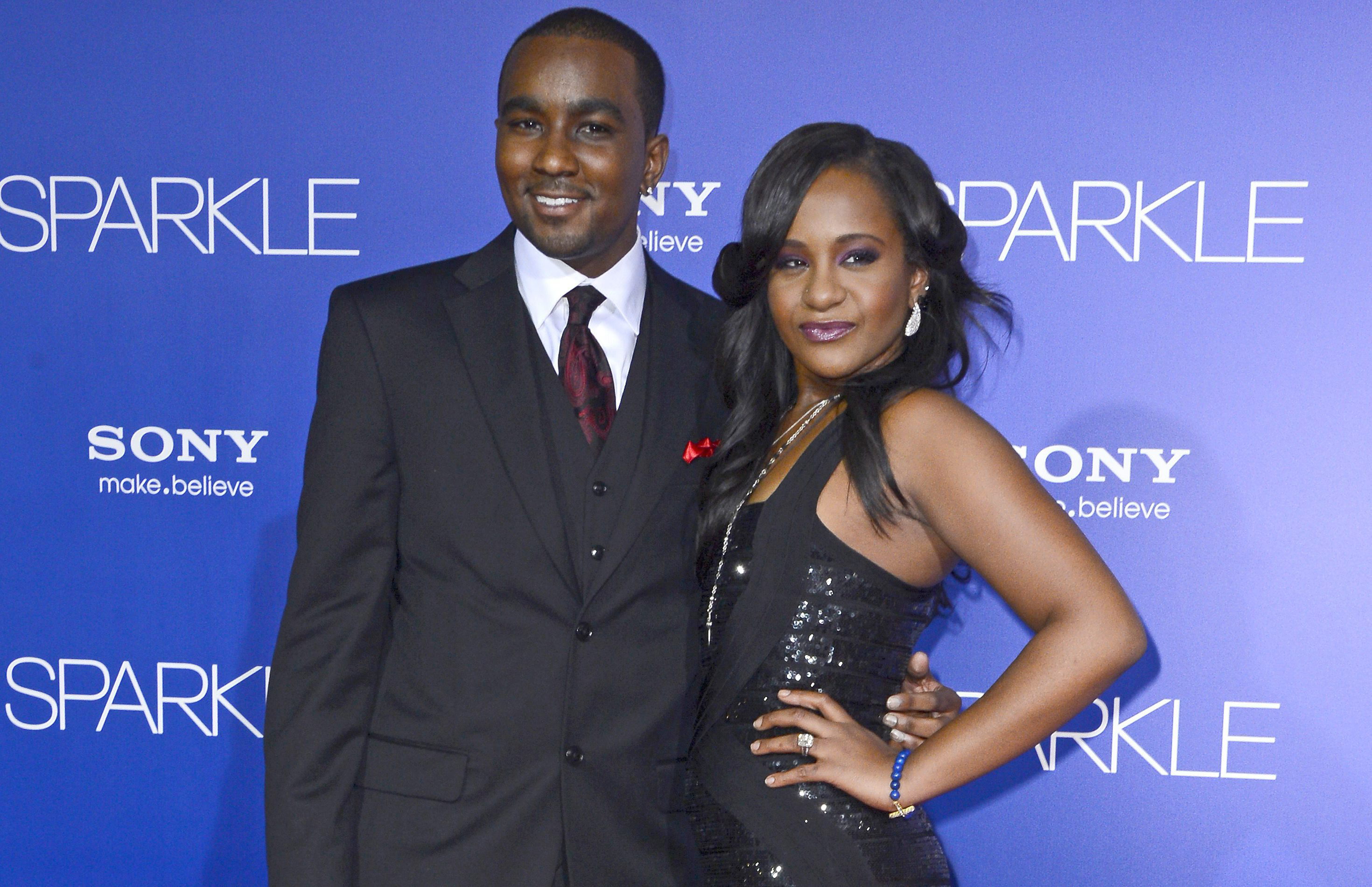 Bobbi Brown ao lado do irmão adotivo Nick Gordon | Paul Buck/Efe