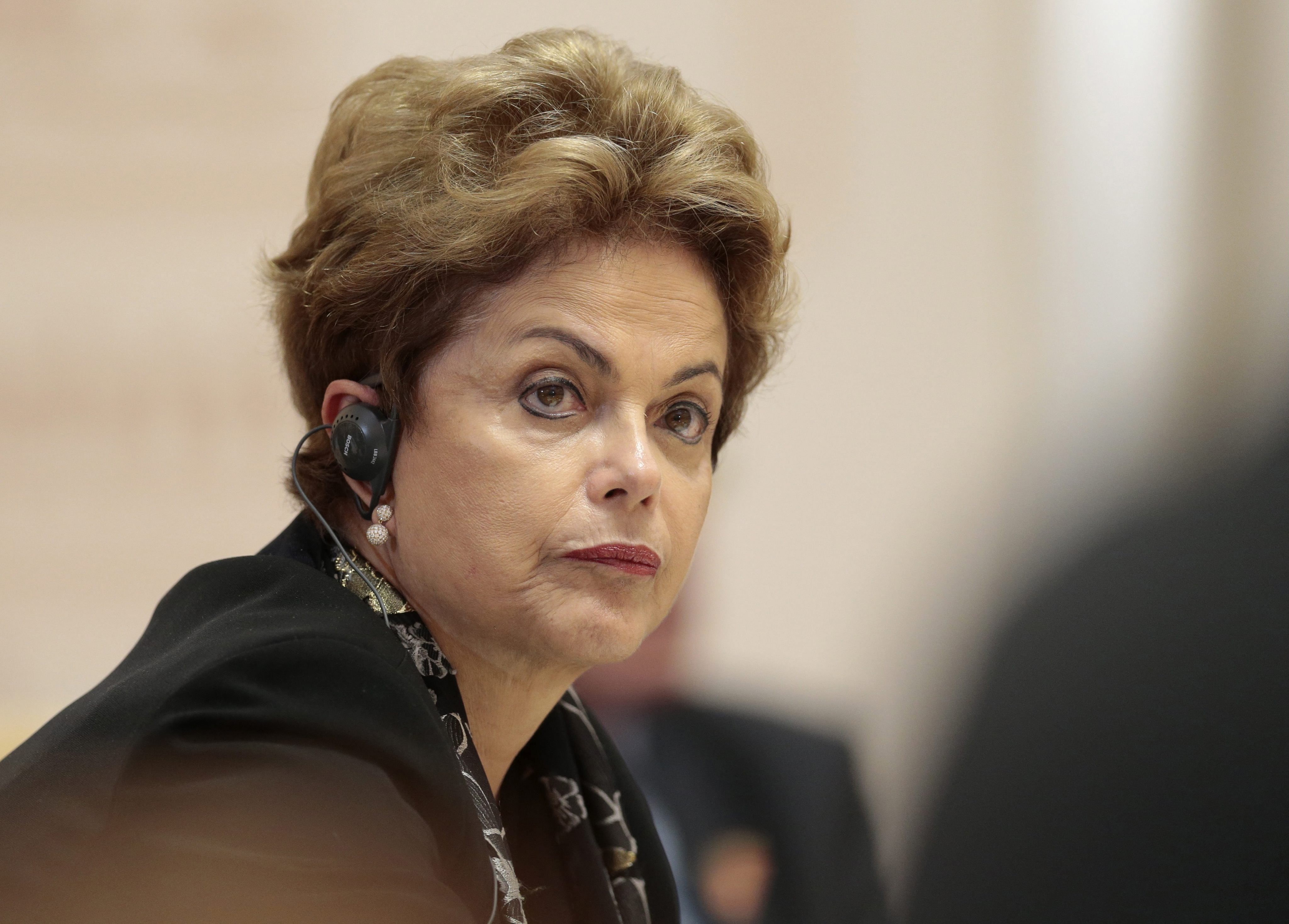 Na Rússia para reunião do Brics, Dilma voltou a cutucar o senador mineiro Aécio Neves. | Ivan Sekretarev/ 
EFE