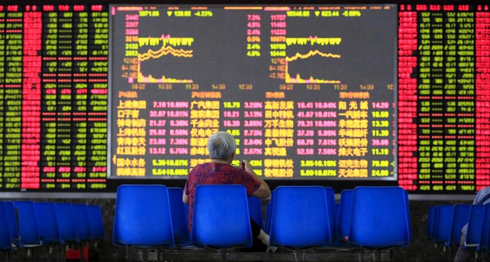 Corretora de ações na China: tensão na bolsa. | ALY SONG/REUTERS