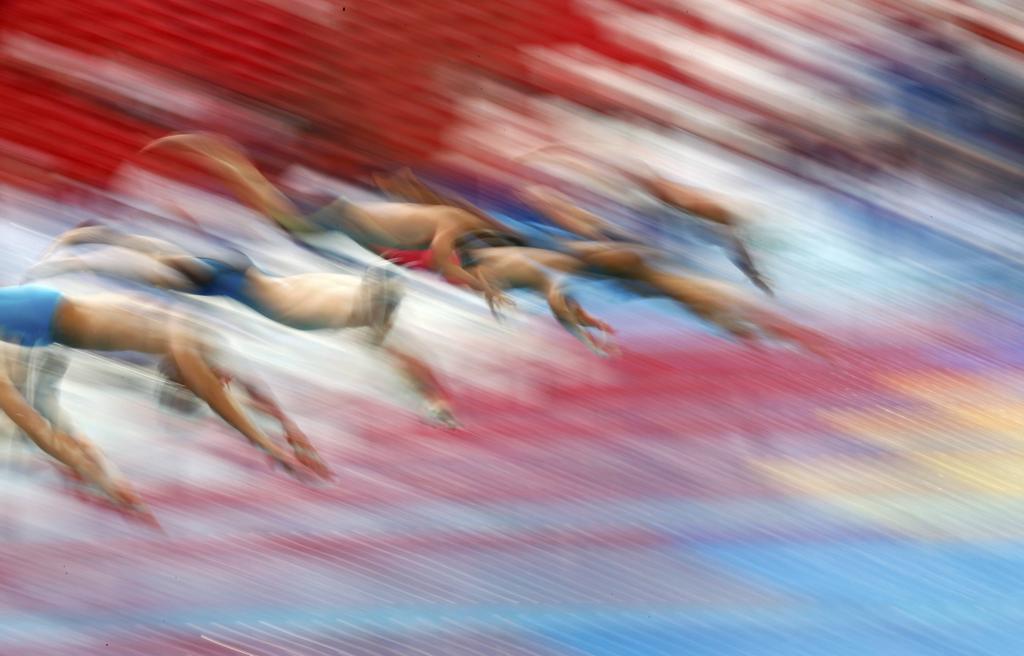 Largada dos 50m livre: prova mais rápida da natação tem espaço para nadadores lentos. | STEFAN WERMUTH/REUTERS