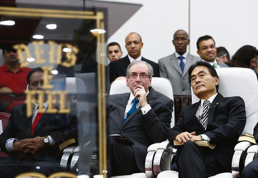 Cunha com o pastor e deputado Takayama: “Quanto a mim, contemplarei a tua face na Justiça”. | Daniel Castellano/Gazeta do Povo