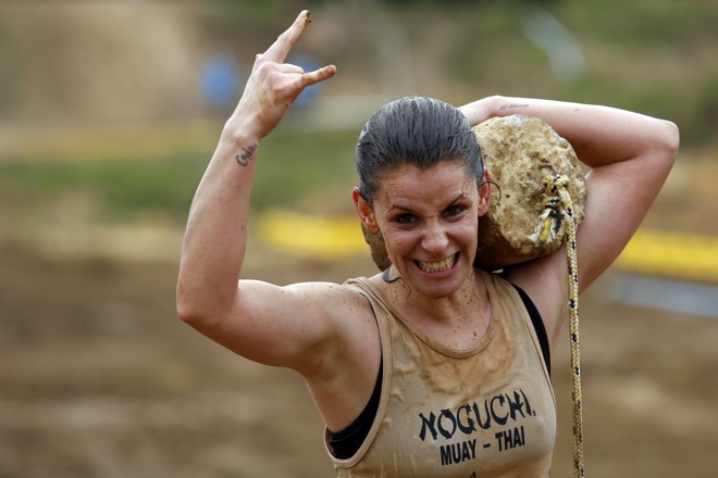 Bom humor na hora de fazer força. | Foto: Henry Milleo/Gazeta do Povo