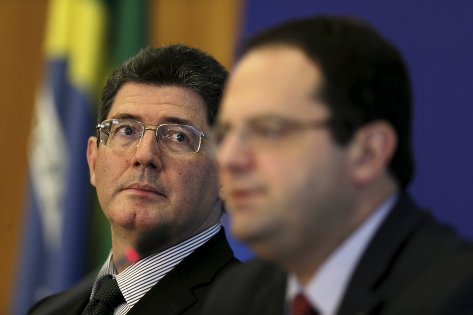 Levy com Barbosa: embaraço e ordens da presidente Dilma. | Ueslei MArclelino/Reuters