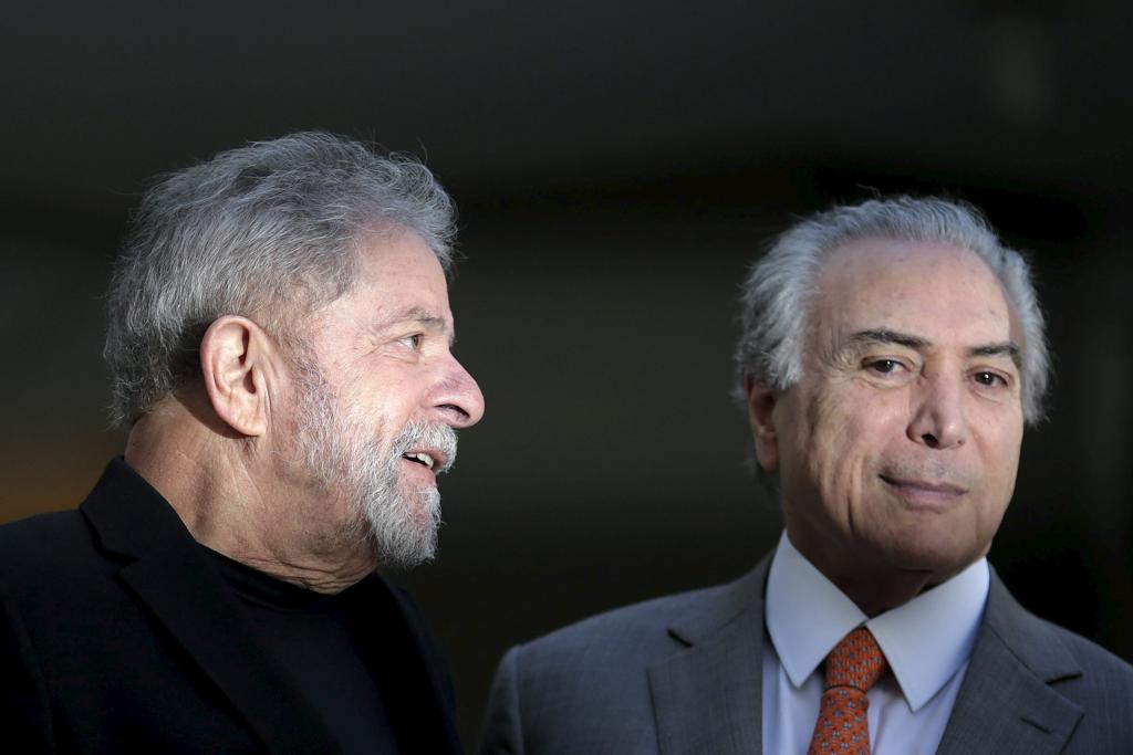 Lula e Temer: caciques partidários tentam negociações. | Ueslei Marcelino/Reuters