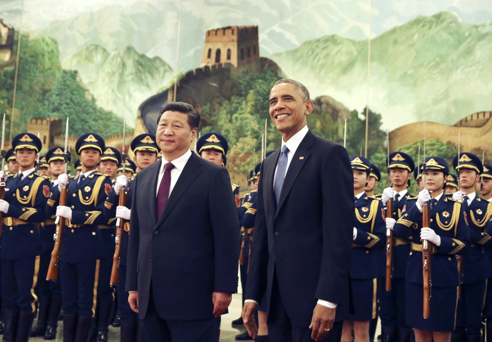 Xi Jinping e Barack Obama durante visita do presidente dos EUA a Pequim: desaceleração da economia preocupa governo | Andy Wong /AP