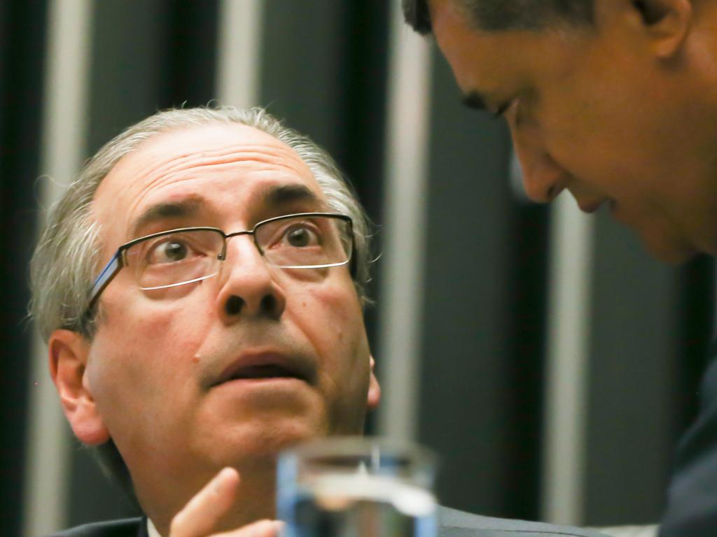 Cunha conversa com o líder do governo na Câmara, José Guimarães (PT-CE). | Lula Marques/Agência PT