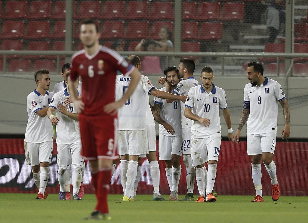 Equipe grega celebra vitória, para lamento dos húngaros, que irão para a repescagem | ALKIS KONSTANTINIDIS/REUTERS