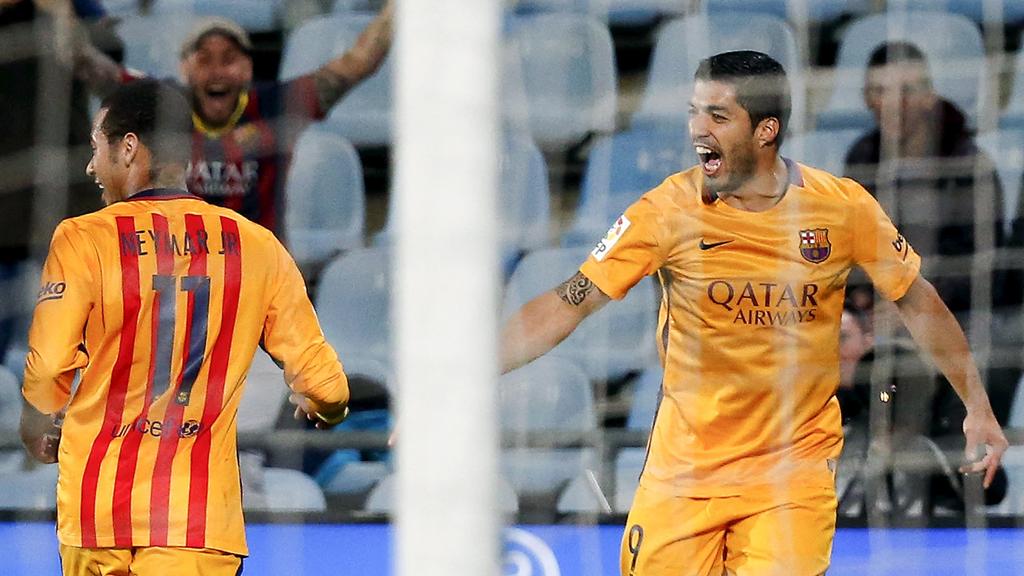 Suárez comemora gol com Neymar: dupla garantiu a vitória do Barcelona sobre o Getafe. | ANDREA COMAS/REUTERS